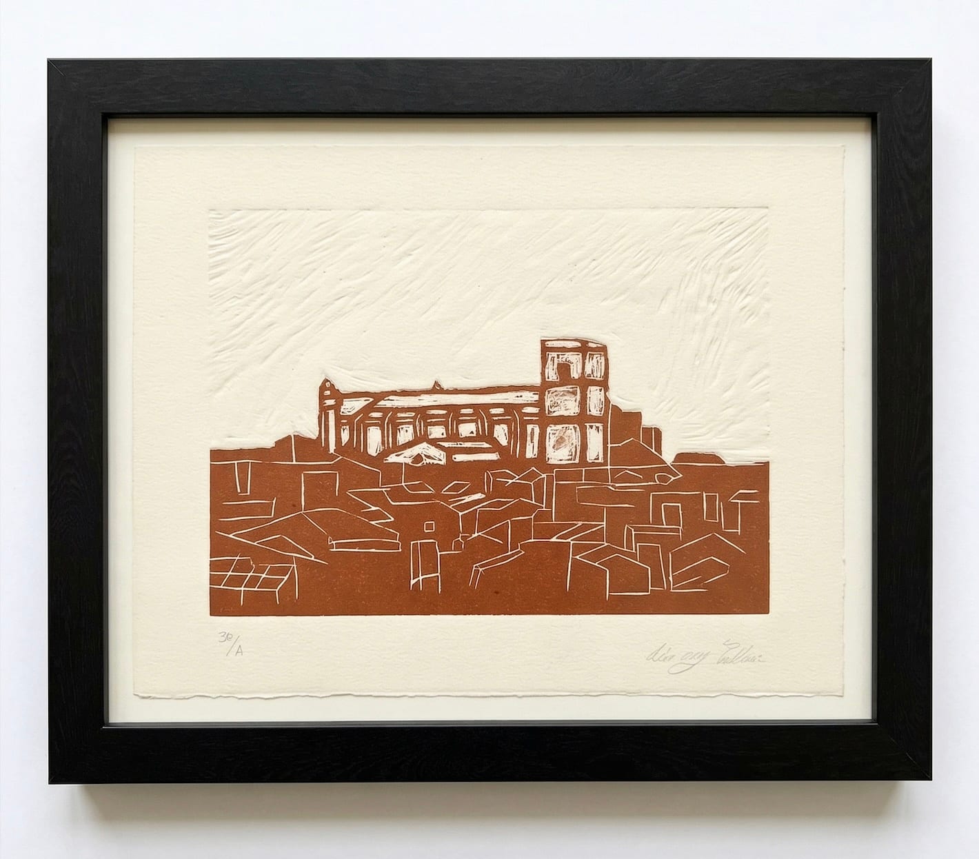 Linocut engraving of Alaior rooftops and church at Palliser Law Firm